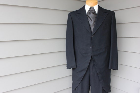 vintage 1910's - 20's Men's Morning suit. Black wool flannel. Peaked lapel - 2 button coat. Pleat front pant. Size 40 x 34" Waist. Germany