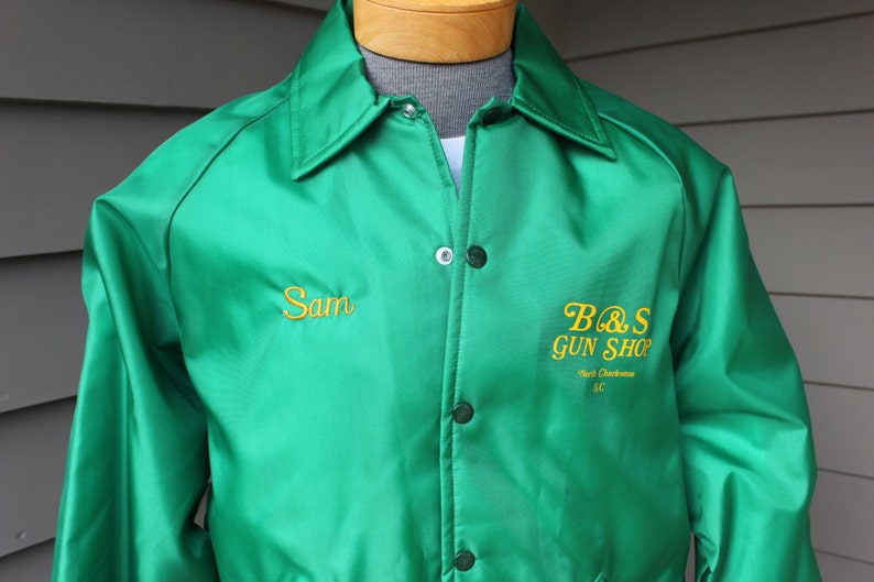 vintage 70's 80's Men's Nylon Oxford wind breaker. 'New Old Stock'. B & S Gun Shop Fleece Lined. Medium image 1