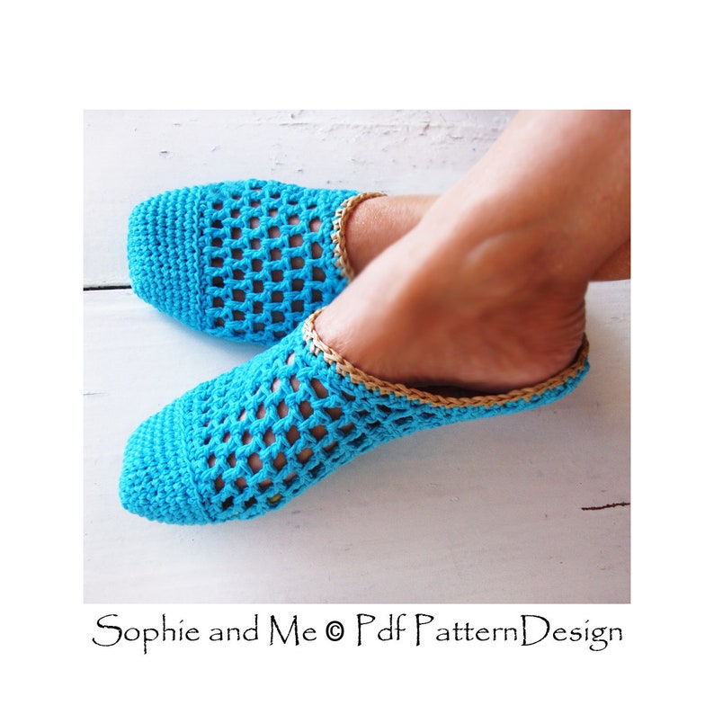 May include: A pair of crocheted slippers in a bright turquoise blue color. The slippers have a simple, open-weave design and are lined with a tan crocheted trim.