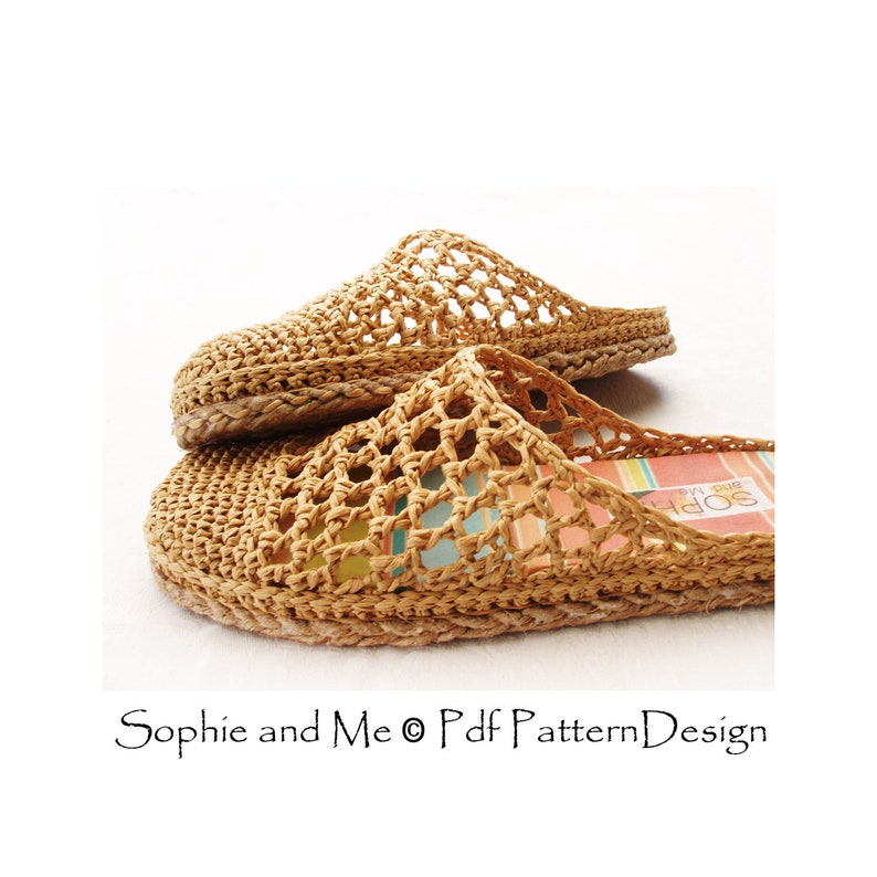 May include: A pair of crocheted straw sandals with a woven design. The sandals have a flat sole and are made of natural materials.