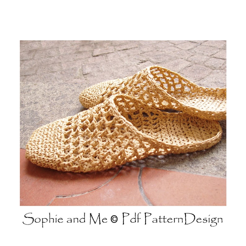 May include: A pair of crocheted beige slippers with a woven pattern. The slippers are made of a lightweight material and have a comfortable fit.