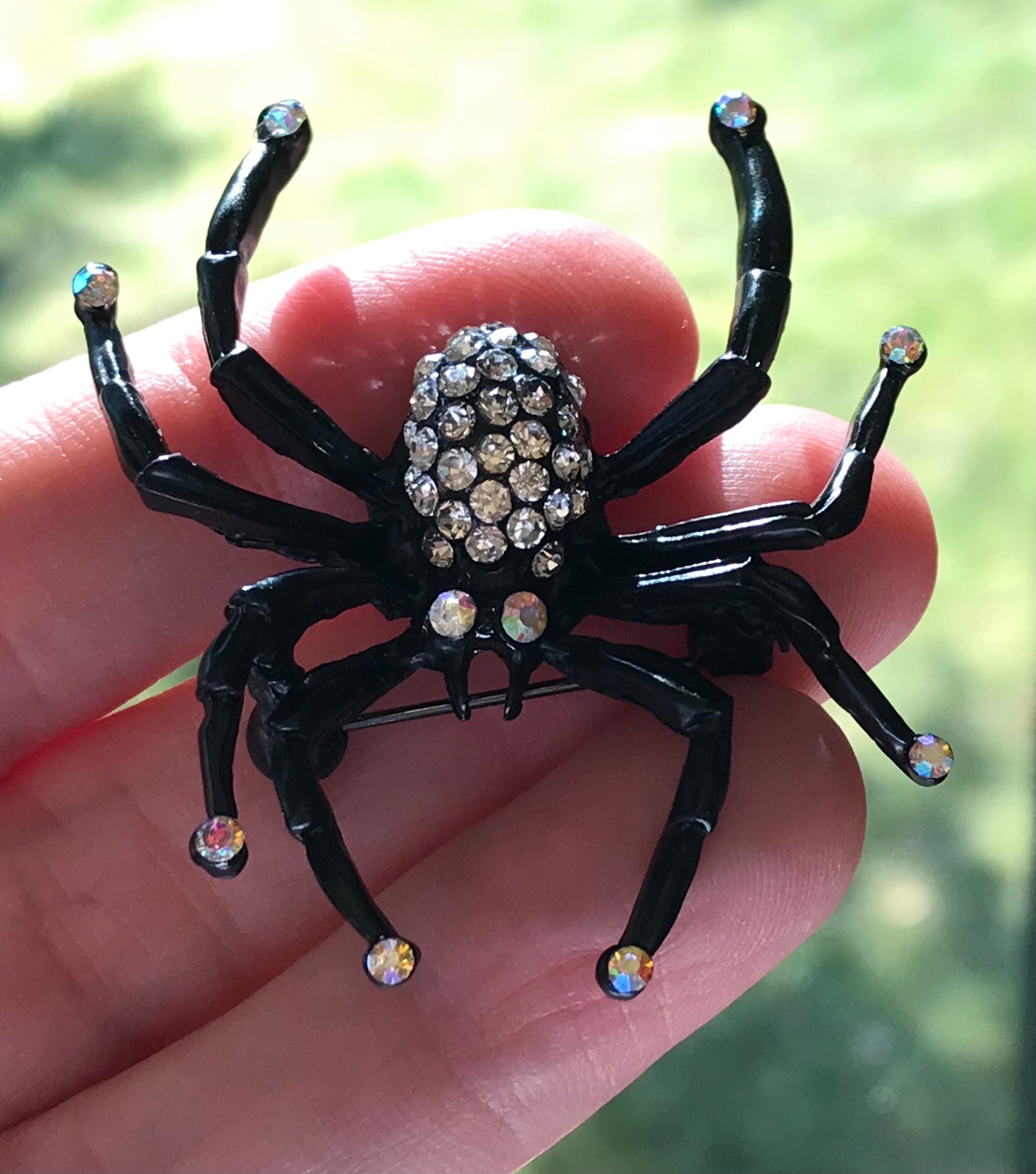 Art Deco period red galalith spider brooch - photographed by