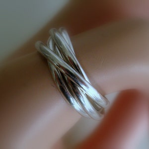 Herrenschmuck. Fünf Interlocked Organic Bänder.Sterling Silber Unisex Rolling Ring