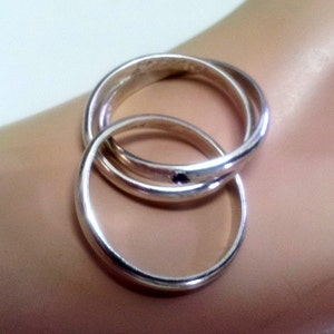Rollender Ring mit Amethyst Drei Interlocked Organic Bändern. Russischer Ehering