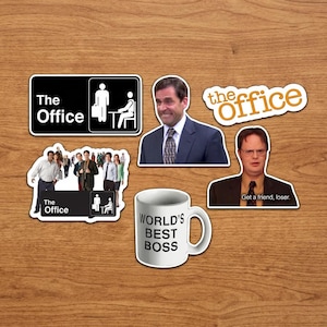 May include: A collection of stickers and a mug featuring imagery from the TV show "The Office." Stickers include the show's logo, characters, and the phrase "World's Best Boss" on a white mug. The stickers are various shapes and sizes.