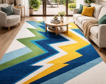 Alfombra moderna geométrica en zigzag con diseño abstracto y colorido para sala de estar, color azul, verde y amarillo.