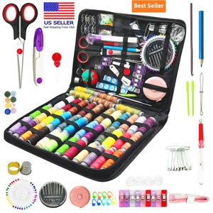 May include: A black zippered sewing kit filled with colorful spools of thread, needles, scissors, buttons, and other sewing notions. The kit includes a variety of sewing tools and accessories for various projects. The image also includes a US flag.
