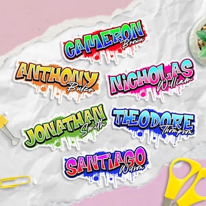 May include: Colorful name stickers in a graffiti style. Each sticker features a different name, such as "Cameron," "Anthony," and "Nicholas," with a matching last name. The names are in bold, outlined letters with a dripping paint effect.