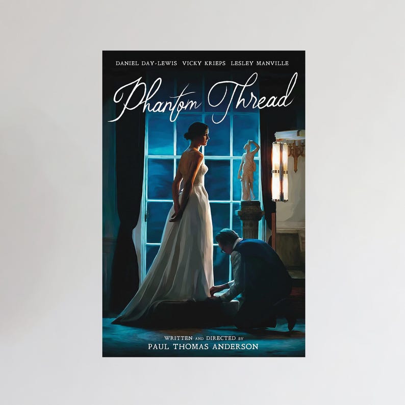 May include: Film poster for "Phantom Thread" starring Daniel Day-Lewis, Vicky Krieps, and Lesley Manville. The poster displays a woman in a white gown, a kneeling man, and the title in a stylish font. Directed by Paul Thomas Anderson.