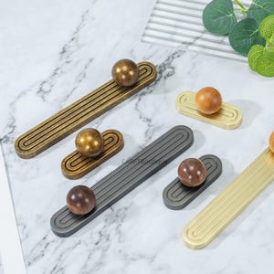 Unika skåpknoppar med bakplatta: Rustika lådhandtag, vintage dörrknoppar och handtag