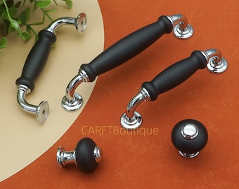 Zwarte kastknoppen, verchroomde keukendeurgrepen: hardware voor ladegrepen