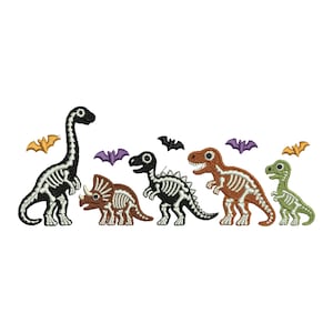 May include: Embroidered design of five dinosaurs with skeleton details in black, brown, and green. Bats in orange and purple are scattered above the dinosaurs, all set against a white background. A fun, Halloween-themed design.