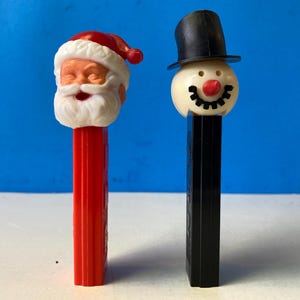 Pair PEZ No Feet Santa & Snowman READ