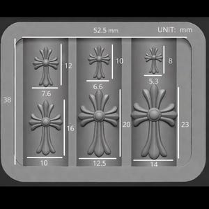 May include: A gray 3D rendering of three cross designs in varying sizes. The largest cross is 23 mm tall and 14 mm wide. The smallest cross is 8 mm tall and 5.3 mm wide. The image includes measurements in millimeters.