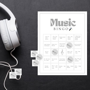 Music bingo printable game displayed with headphones and bingo chips, fun music party game for adults, family gatherings and group game nights
