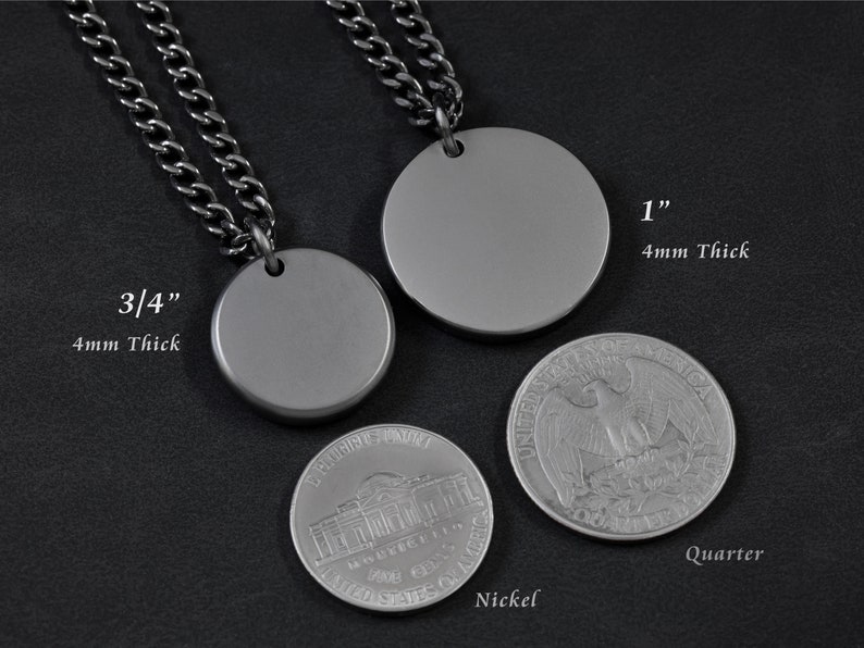 May include: Two silver round pendant necklaces with a chain. The smaller pendant is 3/4 inch in diameter and the larger pendant is 1 inch in diameter. Both pendants are 4mm thick. A US quarter and nickel are shown for size comparison.