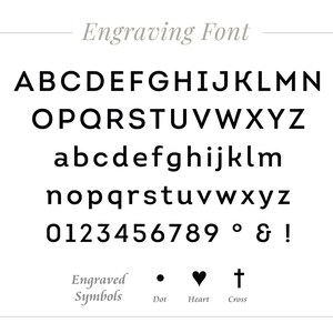 May include: Engraving font alphabet with uppercase and lowercase letters, numbers, symbols, and punctuation marks. The symbols include a dot, heart, and cross.