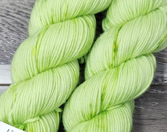 RTS Udea Mythical Gods Collection SW DK Light Worsted Weight Yarn Bright Lime Green Semi Solid Tonal Speckle Superwash Merino Wool