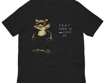 Lustiges Frosch-T-Shirt: "The Frog Is Alive" - Amphibien Liebhaber Geschenk."