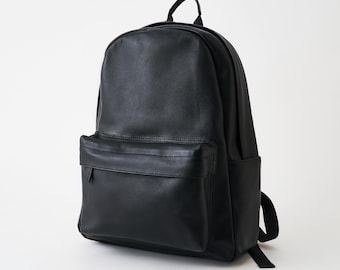 Zaino unisex morbido in pelle di mucca nera minimale per laptop da 13 pollici