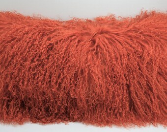 orange fur pillows