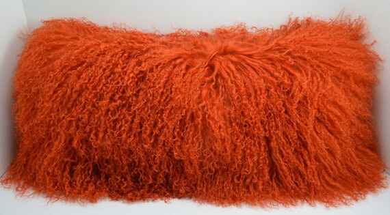 orange fuzzy pillow
