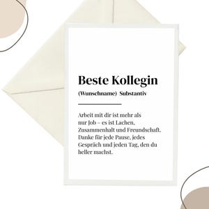 May include: A white greeting card with the text "Beste Kollegin" and additional German text, inside a cream-colored envelope. The card has a simple, elegant design with a minimalist aesthetic. The text is in a bold, sans-serif font.