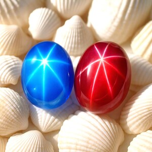 Par de piedras preciosas de rubí estrella y zafiro, cabujones ovalados de 20 ct