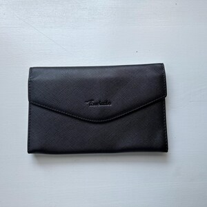 Cartera de viaje vintage de piel sintética negra de los años 90 "Travelambo"