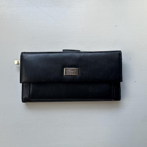 Cartera vintage de piel color mantequilla negra de Pelle Studio, años 90