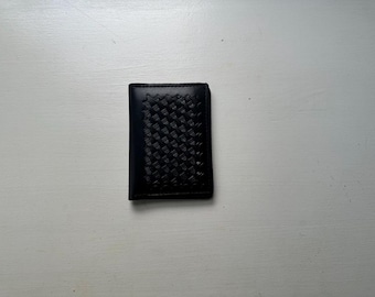 Vintage 90s 'Tex Shoemaker and Sons Inc' Black Embossed Leather Bifold Wallet