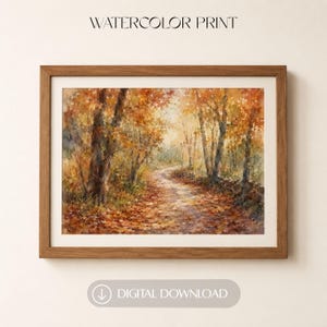May include: A framed watercolour print featuring a path through an autumn forest with orange, yellow, and brown foliage. The text WATERCOLOUR PRINT appears above the frame, and the text DIGITAL DOWNLOAD appears in a grey oval below the frame.