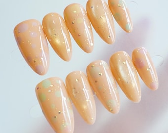 Diseño de uñas de lunares, uñas postizas con efecto ojo de gato y purpurina dorada, uñas postizas reutilizables.