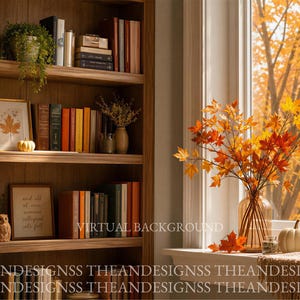 May include: A wooden bookshelf filled with books, a small potted plant, a framed maple leaf print, a white pumpkin, an owl figurine, and a framed sign. A glass vase with orange and yellow maple branches sits on a windowsill next to two pumpkins.