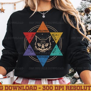 May include: Black sweatshirt featuring a cat face design within a star. The design includes the words "Wind," "Shadow," "River," "Star," "Thunder," and "Sky." The text "PNG DOWNLOAD - 300 DPI RESOLUTION" is at the bottom.