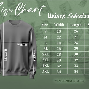 Puede incluir: Un su&eacute;ter unisex gris con una tabla de tallas. La tabla enumera las medidas en pulgadas para el ancho, la longitud y la manga para las tallas S a 5XL. El fondo presenta un dise&ntilde;o tem&aacute;tico de dinero.