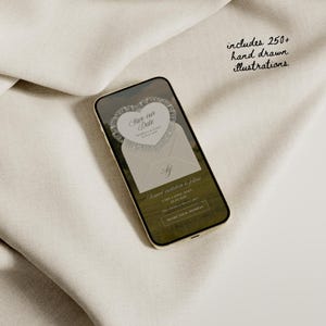 May include: A smartphone displays a wedding invitation design with a heart-shaped "Save our Date" graphic. The phone rests on a cream-colored fabric. Text on the screen includes "Formal invitation to follow" and "Share your address."