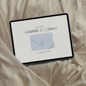 May include: A digital invitation on a tablet screen. The invitation features the names "Arabella & James" in elegant script, with a light blue envelope graphic and the text "Click envelope to open."