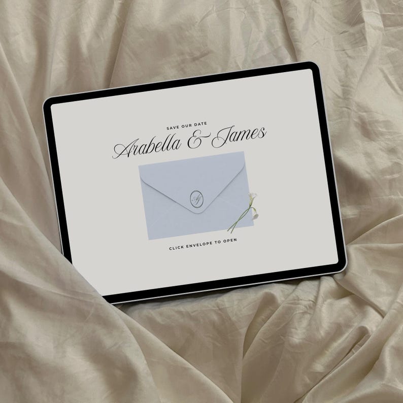 May include: A digital invitation on a tablet screen. The invitation features the names "Arabella & James" in elegant script, with a light blue envelope graphic and the text "Click envelope to open."