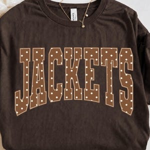 Jackets PNG, Fall Jackets Mascot PNG, Brown Polka Dot Varsity Shirt Design, School Spirit Game Day Sublimation PNG