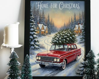 May include: A framed print with the text "Home for Christmas" shows a red car with a Christmas tree on its roof, travelling through a snowy forest. The scene includes snow-covered trees, houses, and a candle with miniature Christmas trees.