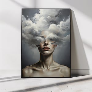 May include: A framed art print depicting a person with a cloud obscuring the eyes and head. The artwork uses a muted palette of greys and skin tones, creating a surreal and introspective atmosphere.