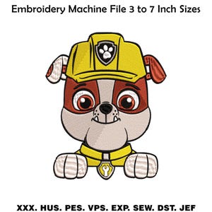 May include: An embroidered design of a cartoon dog wearing a yellow helmet with a badge. The dog has brown and white fur, large eyes, and is smiling. The text "Embroidery Machine File 3 to 7 Inch Sizes" is at the top.