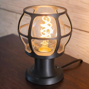 Industrial Cage Lamp Vintage Style Edison Bulb Table Lamp Bedside Lighting Warm Ambient Light Fixture Metal Design Desk Accent Nightstand