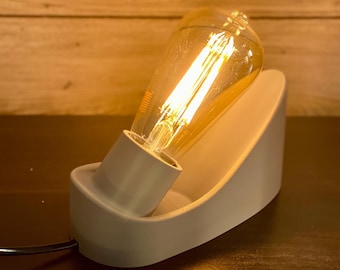 Minimalist Table Lamp Industrial Design Curved Base Edison Bulb Amber Glow Vintage Lighting Bedroom Accessory Desk Light Nightstand – Cōve