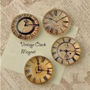 May include: Four round magnets with vintage clock faces. Each magnet features a different clock design with Roman numerals and black hands. The text "Vintage Clock Magnet" is printed on a cream-colored card.