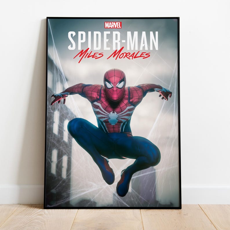 May include: Marvel Spider-Man Miles Morales poster. The poster features Spider-Man in a dynamic pose, wearing a red and blue suit. The title is displayed in red and white text against a cityscape background.