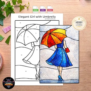 Op de afbeelding: Een digitale kleurplaat getiteld Elegant Girl with Umbrella door PixelPunksStudio, met een genummerd lijntekeningsjabloon naast een voltooide illustratie in glas-in-loodstijl van een persoon in een blauwe jurk met een rood en geel paraplu.