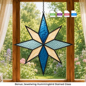 May include: An eight-pointed star suncatcher made of stained glass with alternating dark blue, light blue, and cream-colored textured panels framed in black metal. The star hangs from a chain and includes digital file icons for PDF, JPG, PNG, and SVG.