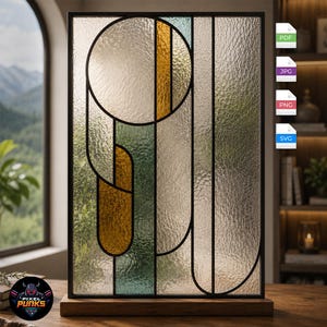 Puede incluir: Un panel rectangular de vidrieras con marco de metal negro y base de madera. El diseño presenta vidrio texturizado transparente combinado con formas geométricas en ámbar y verde, dispuestas en una composición vertical de círculos y líneas.